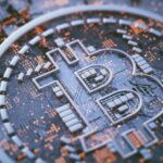 Bitcoin logo on circuit board, illustration